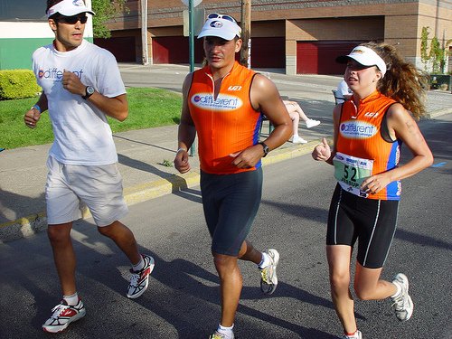 C Different athletes and guides after a race with medals.